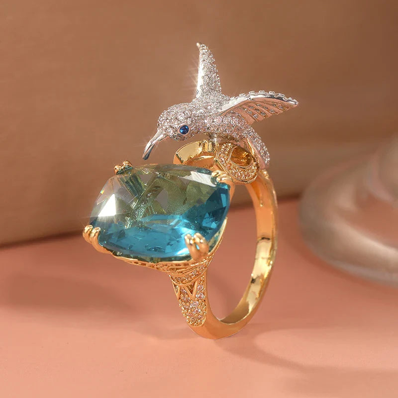 14K Gold Plated Adjustable Hummingbird Ring in Aquamarine Hue